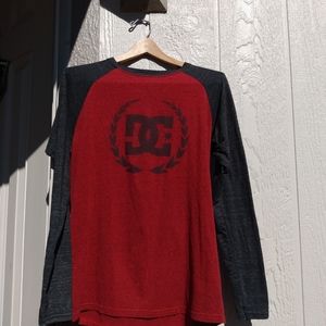 DC black logo red shirt with grey long sleeves Medium